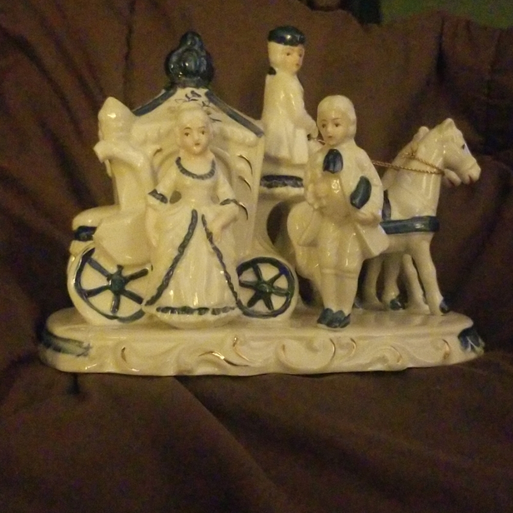 Cinderlla's night out. Blue and white ceramic figu